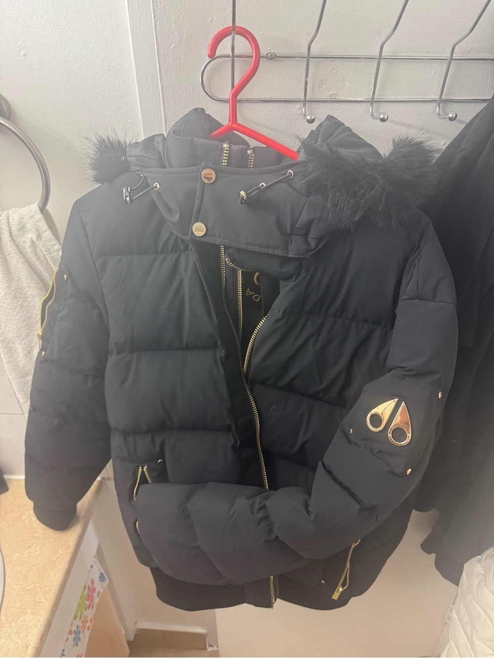 Moose Knuckles Black Jacket with Gold Logo and Hardware